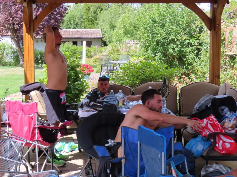 Runners sharing a conversation in the recovery shelter