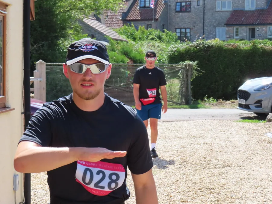 Runners together at a previous PWR start line